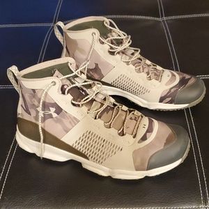 Under Armour high top sneakers. Good Condition. No Box.